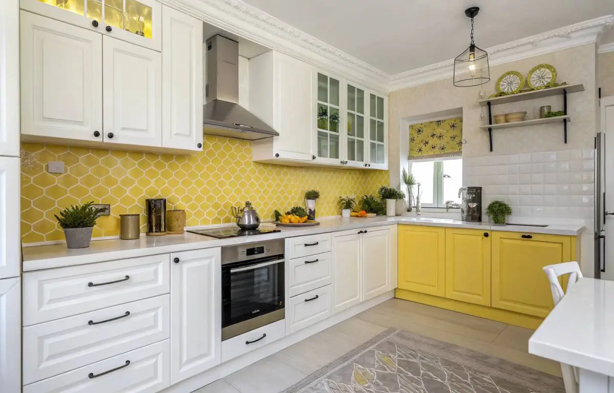 White kitchen accented with lemon yellow